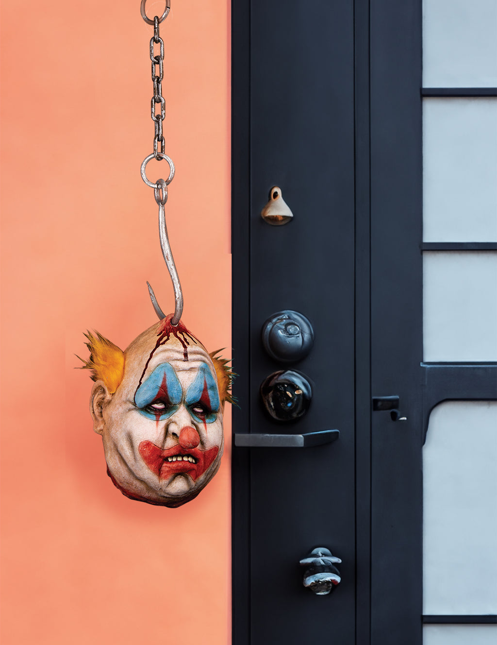 Le cirque maudit — tête de clown à suspendre, 52 cm