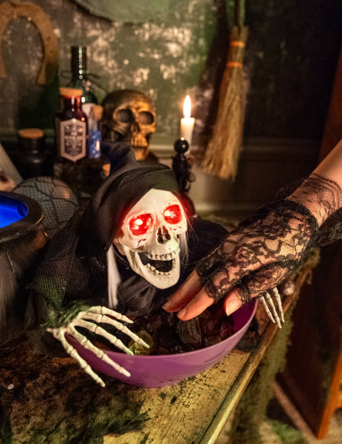 Faucheur macabre avec bol lumineux 52 cm