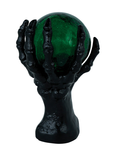 Main squelette noire avec boule de cristal lumineuse